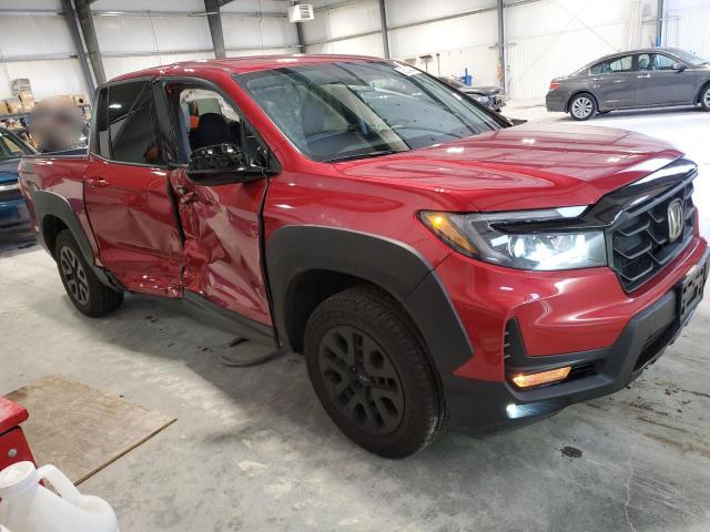 Photo 4 from auction – 2023 HONDA RIDGELINE with VIN 5FPYK3F18PB050520