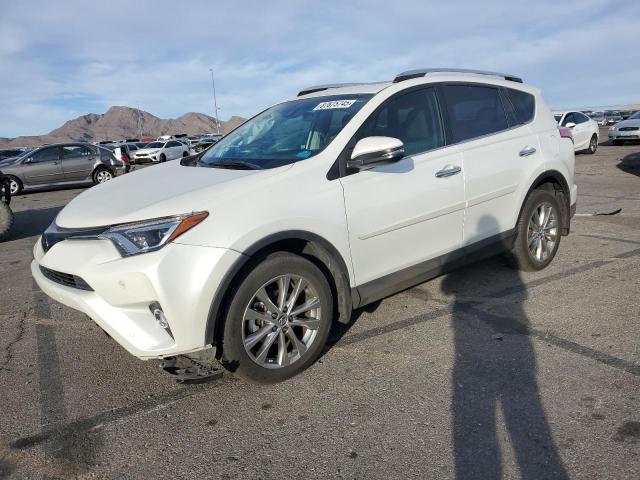 TOYOTA RAV4 LIMIT 2016 with VIN 2T3YFREV9GW309627 - Photo from auction