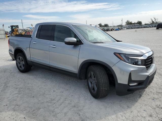 Photo 4 from auction – 2022 HONDA RIDGELINE with VIN 5FPYK3F77NB023200