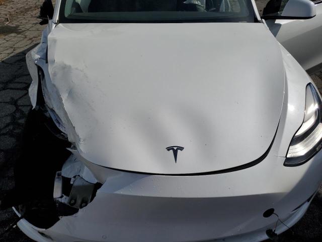 Photo 11 from auction – 2021 TESLA MODEL Y with VIN 5YJYGDEDXMF112989