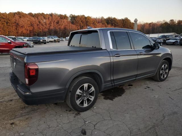Photo 3 from auction – 2019 HONDA RIDGELINE with VIN 5FPYK2F50KB000989