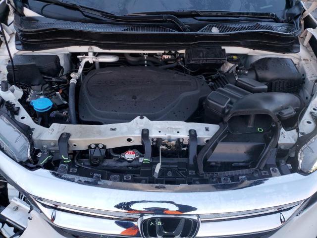 Photo 12 from auction – 2021 HONDA PILOT EX with VIN 5FNYF6H35MB087131