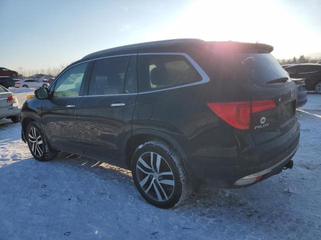 Photo 2 from auction – 2016 HONDA PILOT TOUR with VIN 5FNYF6H95GB507768