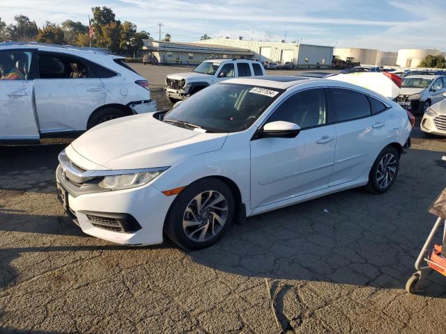 HONDA CIVIC EX 2016 with VIN 2HGFC2F74GH510456 - Photo from auction