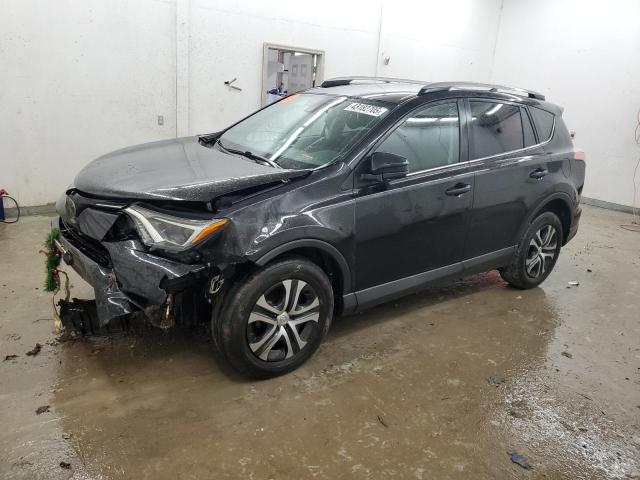 Photo 1 from auction – 2018 TOYOTA RAV4 LE with VIN 2T3BFREV3JW799026