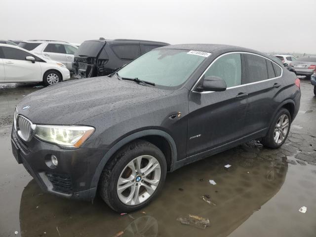 BMW X4 XDRIVE2 2015 with VIN 5UXXW3C5XF0F88697 - Photo from auction