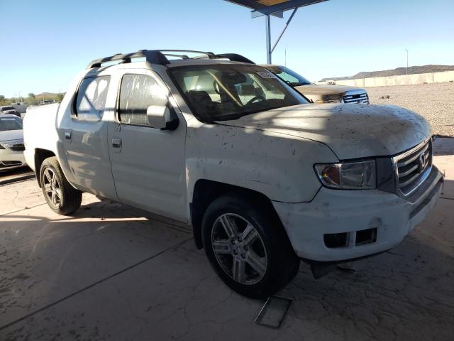 Photo 4 from auction – 2014 HONDA RIDGELINE with VIN 5FPYK1F51EB011627
