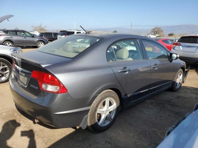 Photo 3 from auction – 2010 HONDA CIVIC HYBR with VIN JHMFA3F22AS001026