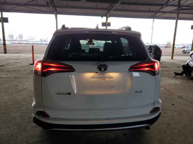 Photo 6 from auction – 2017 TOYOTA RAV4 XLE with VIN JTMWFREV5HD107387