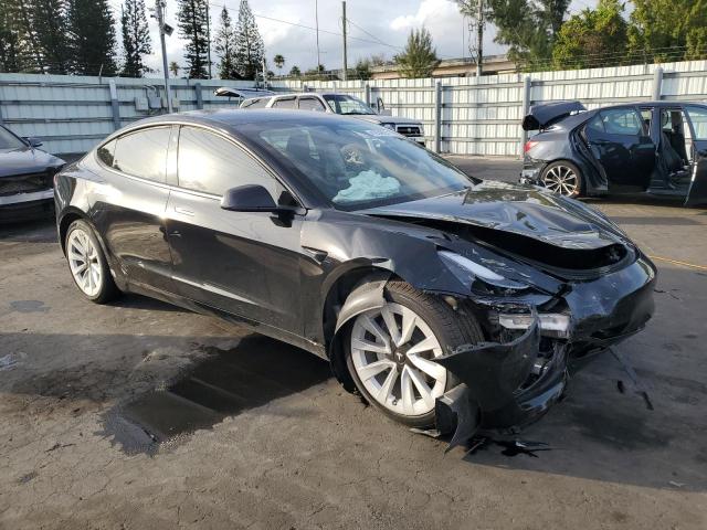 Photo 4 from auction – 2023 TESLA MODEL 3 with VIN 5YJ3E1EA1PF595569