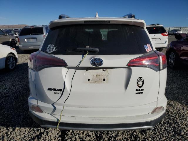 Photo 6 from auction – 2016 TOYOTA RAV4 XLE with VIN JTMRFREV1GJ103141