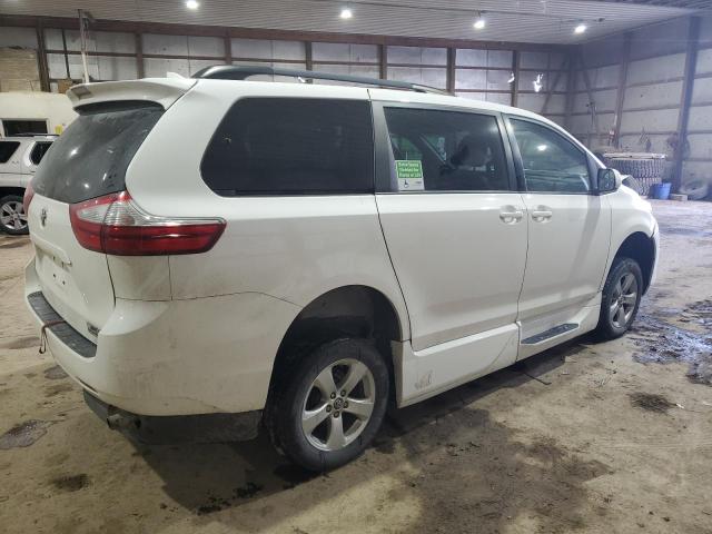 Photo 3 from auction – 2018 TOYOTA SIENNA LE with VIN 5TDKZ3DC0JS934257