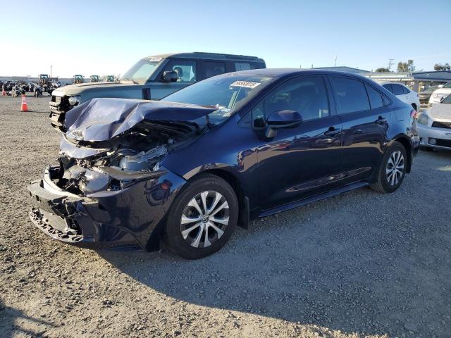 TOYOTA COROLLA LE 2022 with VIN JTDEAMDE9NJ059601 - Photo from auction