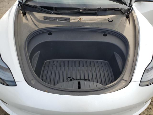 Снимка 11 от търг – 2023 TESLA MODEL 3 с VIN 5YJ3E1EA4PF574778