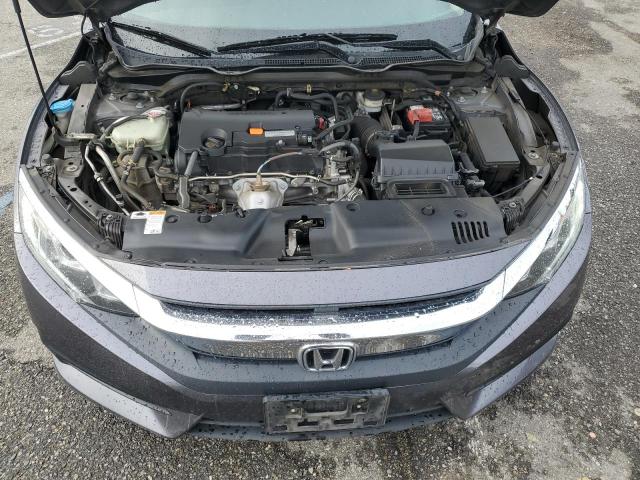 Photo 11 from auction – 2018 HONDA CIVIC LX with VIN 2HGFC2F52JH605314