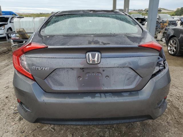 Photo 6 from auction – 2018 HONDA CIVIC LX with VIN 19XFC2F57JE000277