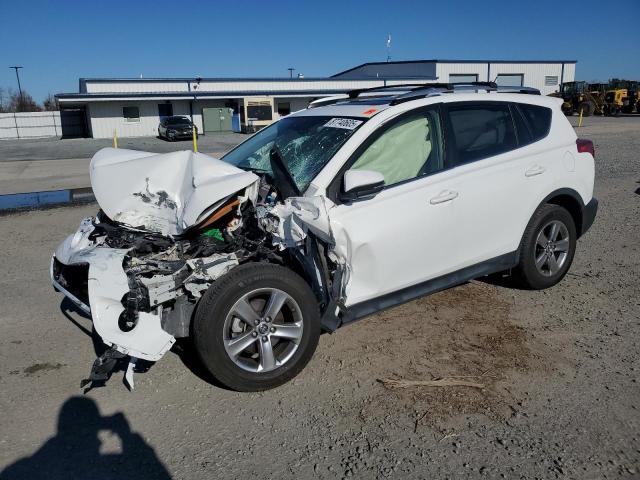 TOYOTA RAV4 XLE 2015 with VIN JTMWFREVXFD065795 - Photo from auction