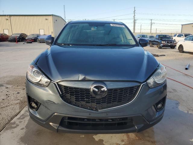Photo 5 from auction – 2013 MAZDA CX-5 GT with VIN JM3KE2DE7D0119401