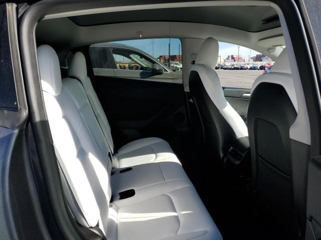 Photo 11 from auction – 2023 TESLA MODEL Y with VIN 7SAYGDEE7PF867758