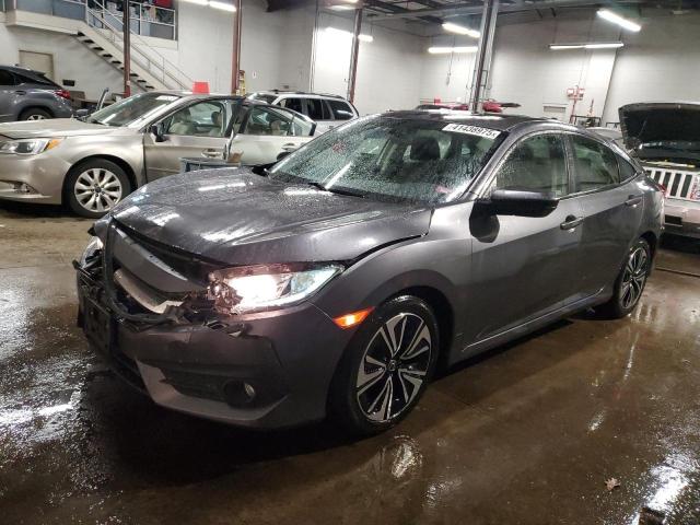 HONDA CIVIC EX 2018 with VIN JHMFC1F36JX018924 - Photo from auction
