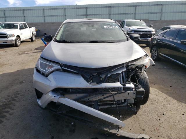 Photo 5 from auction – 2018 TOYOTA RAV4 LE with VIN JTMBFREV8JJ196491