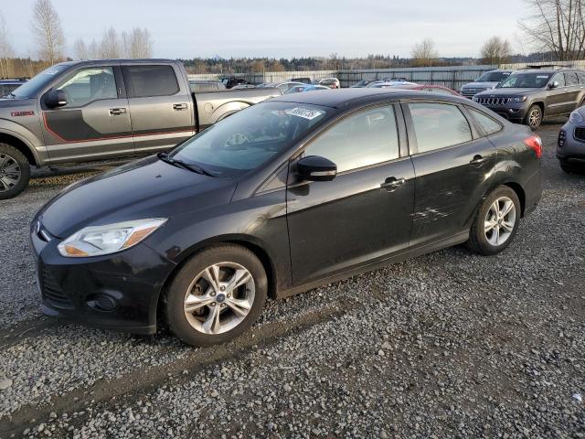 FORD FOCUS SE 2014 with VIN 1FADP3F29EL433237 - Photo from auction