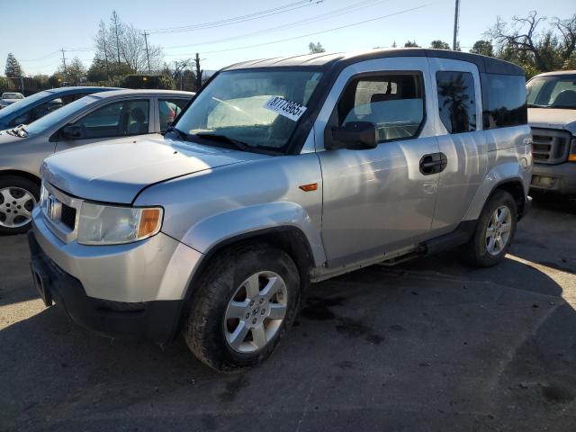 HONDA ELEMENT EX 2011 with VIN 5J6YH2H73BL000238 - Photo from auction