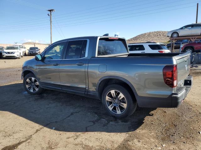Photo 2 from auction – 2017 HONDA RIDGELINE with VIN 5FPYK2F61HB008598
