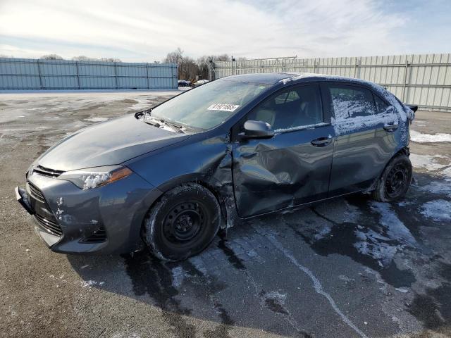 TOYOTA COROLLA LE 2017 with VIN 2T1BPRHEXHC863303 - Photo from auction