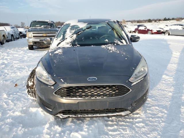 Photo 5 from auction – 2015 FORD FOCUS SE with VIN 1FADP3F20FL208643