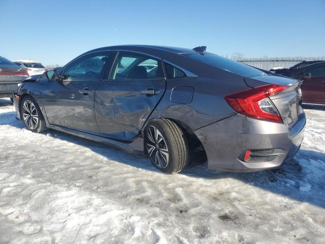 Photo 2 from auction – 2017 HONDA CIVIC EX with VIN 2HGFC1F34HH637085