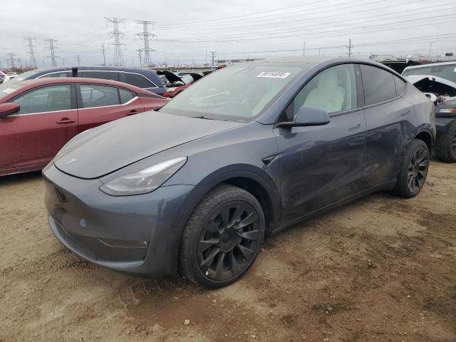 TESLA MODEL Y 2023 with VIN 7SAYGDEE5PF671897 - Photo from auction