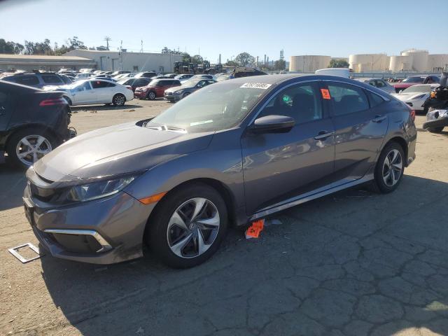 HONDA CIVIC LX 2020 with VIN 19XFC2F65LE207889 - Photo from auction