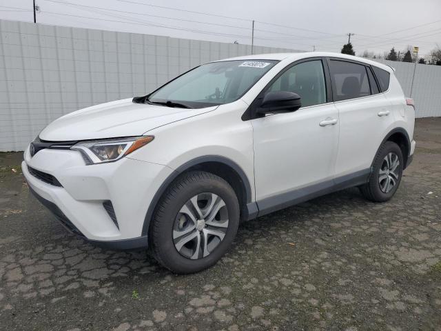 TOYOTA RAV4 LE 2018 with VIN 2T3ZFREV1JW421091 - Photo from auction