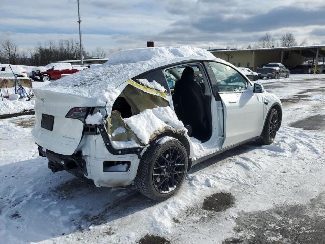 Photo 3 from auction – 2022 TESLA MODEL Y with VIN 7SAYGDEE6NA020952