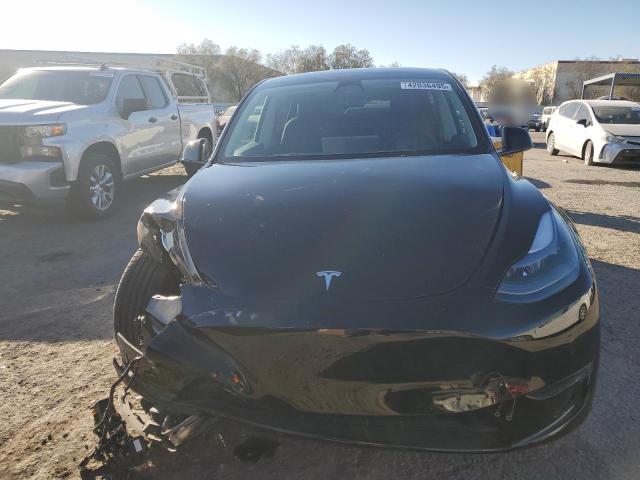 Photo 5 from auction – 2022 TESLA MODEL Y with VIN 7SAYGDEF7NF456561