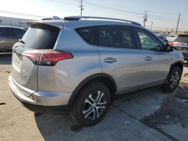 Photo 3 from auction – 2018 TOYOTA RAV4 SE with VIN JTMNFREV5JJ184005