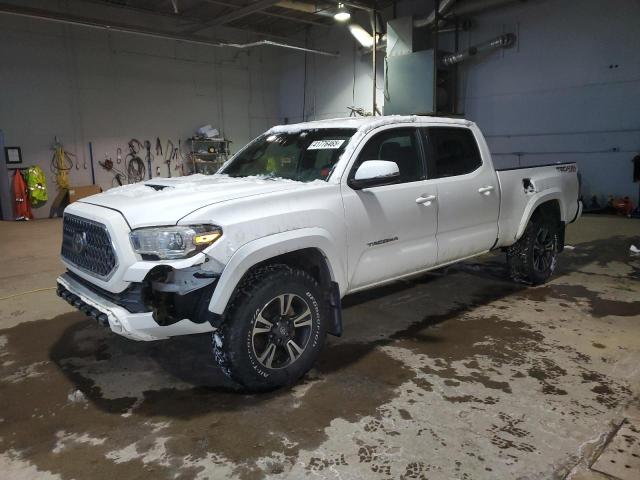 TOYOTA TACOMA 2019 with VIN 5TFDZ5BN2KX039373 - Photo from auction