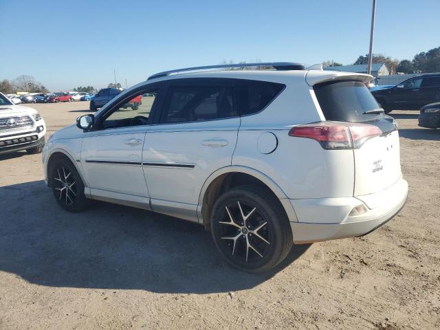 Photo 2 from auction – 2016 TOYOTA RAV4 SE with VIN JTMNFREV5GJ076511
