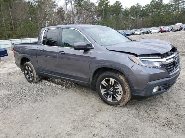 Photo 4 from auction – 2020 HONDA RIDGELINE with VIN 5FPYK3F58LB025324