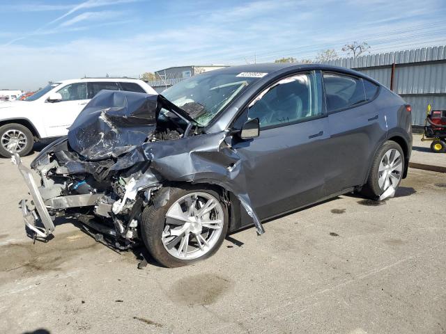 TESLA MODEL Y 2023 con VIN 7SAYGDEE3PA211165 - Foto de la subasta