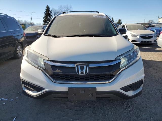 Photo 5 from auction – 2015 HONDA CR-V LX with VIN 2HKRM3H34FH001093