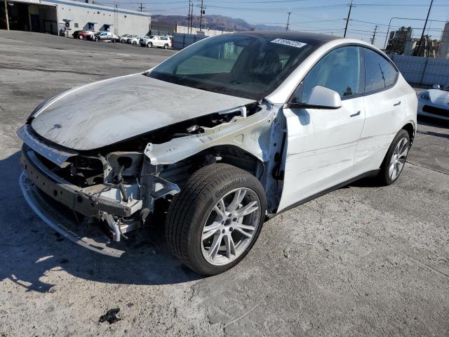 TESLA MODEL Y 2023 with VIN 7SAYGAEE0PF832008 - Photo from auction