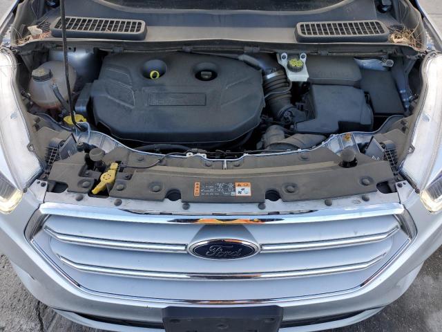 Photo 12 from auction – 2018 FORD ESCAPE TIT with VIN 1FMCU0J97JUD59897