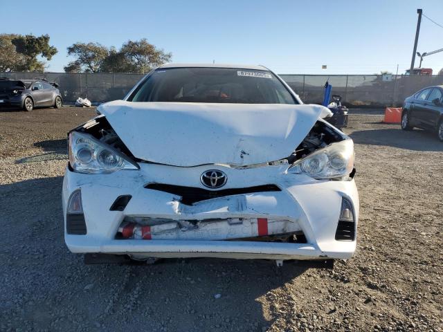 Photo 5 from auction – 2013 TOYOTA PRIUS C with VIN JTDKDTB37D1058290