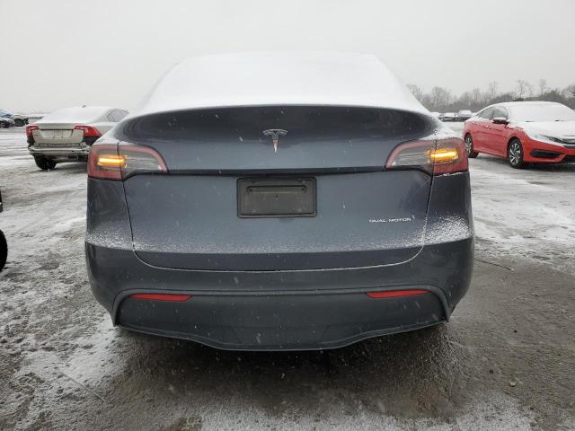 Photo 6 from auction – 2023 TESLA MODEL Y with VIN 7SAYGAEE4PF597693