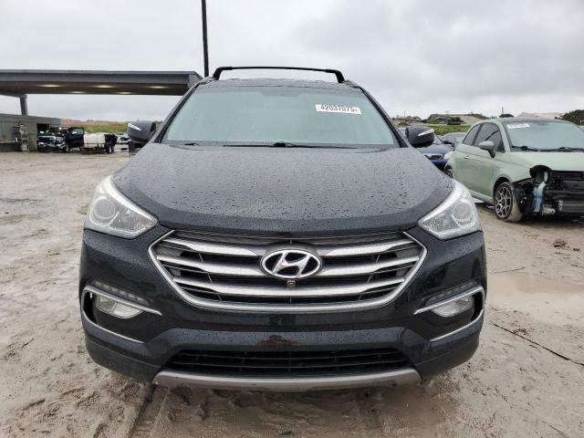 Photo 5 from auction – 2018 HYUNDAI SANTA FE S with VIN 5NMZU3LB8JH066260