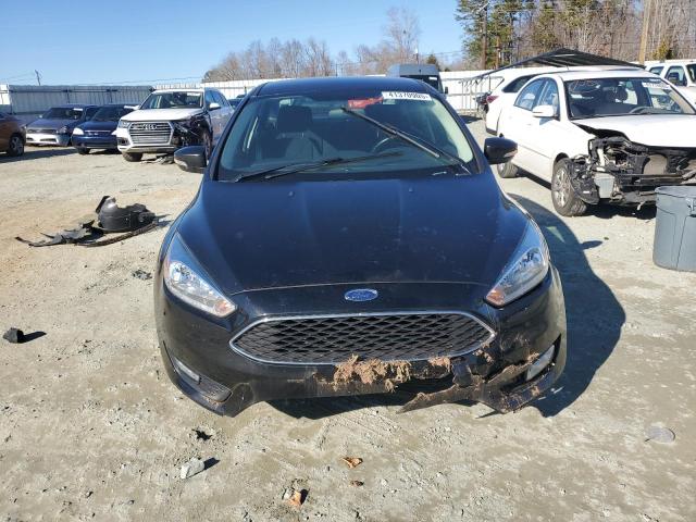 Photo 5 from auction – 2015 FORD FOCUS SE with VIN 1FADP3F21FL311991