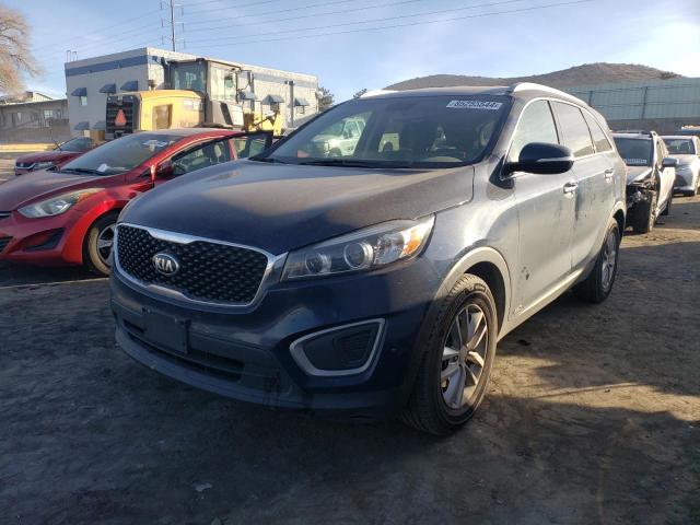 KIA SORENTO LX 2016 with VIN 5XYPGDA3XGG062603 - Photo from auction