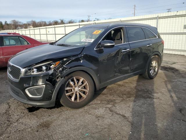 KIA SORENTO LX 2016 with VIN 5XYPG4A35GG011851 - Photo from auction